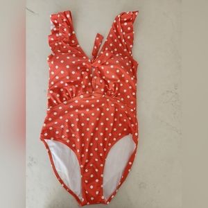 Orange polkadot one piece bathing suit